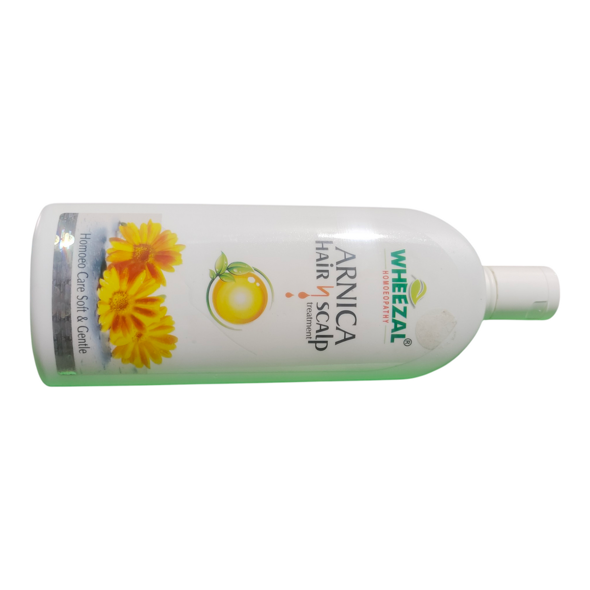 Arnica Wheezal hair and scalp product bottle on a white background