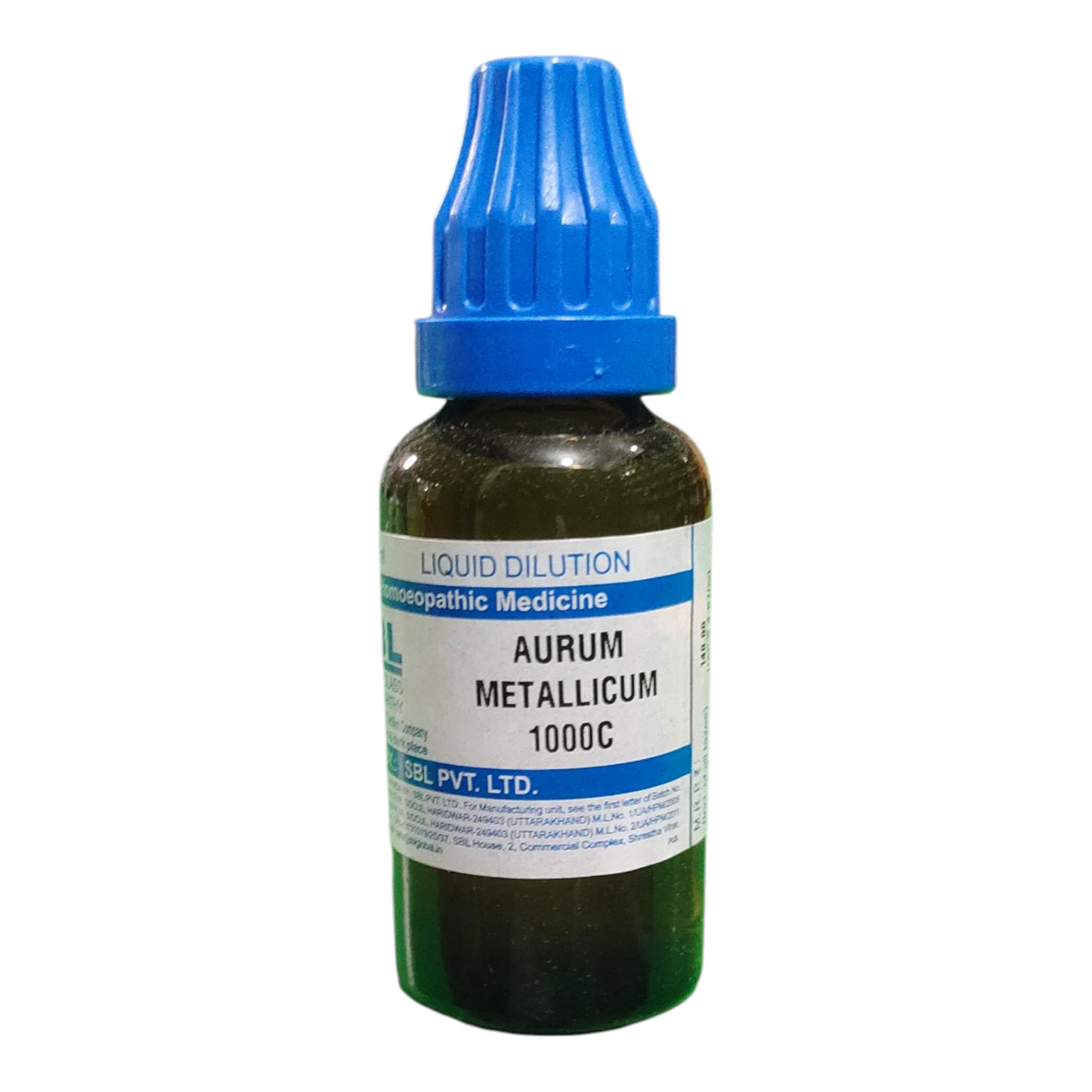 Bottle of Aurum Metallicum 1000C homeopathic medicine with a blue cap on a white background