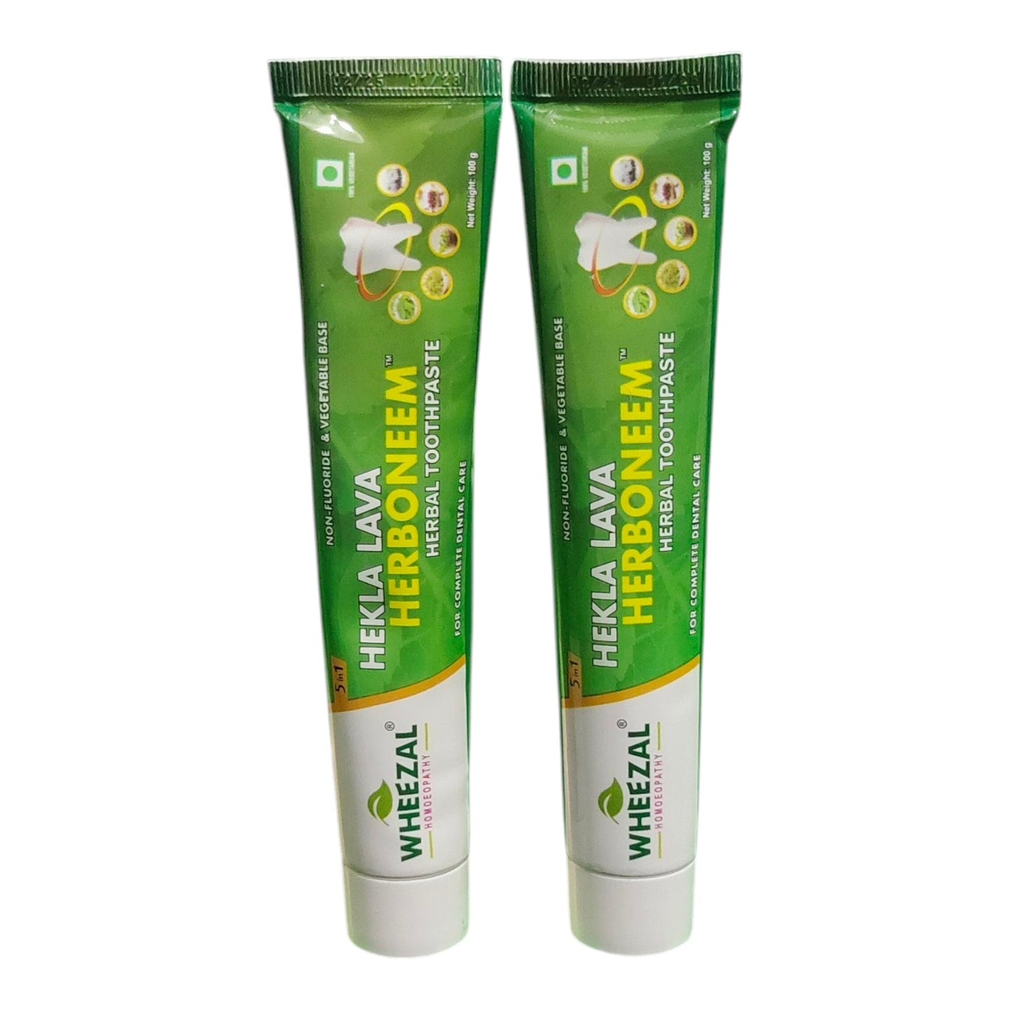 Two tubes of Wheelzal Hekla Lava Herboneen Herbal Toothpaste side by side on a plain white background.
