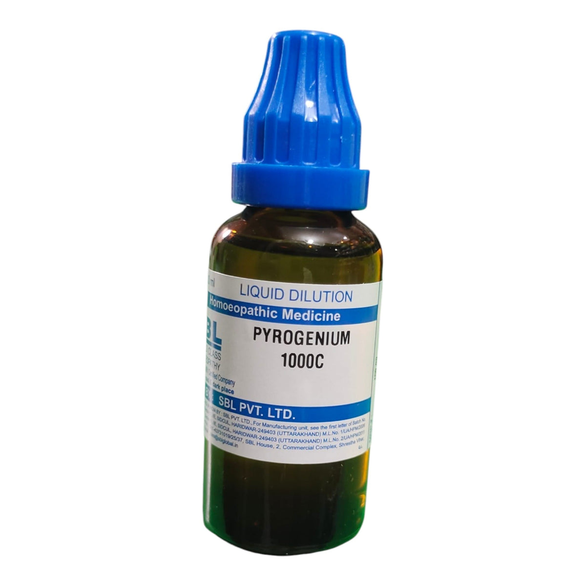 A small amber glass dropper bottle of Pyrogenium 1000C liquid dilution by SPGL, PVT. LTD.