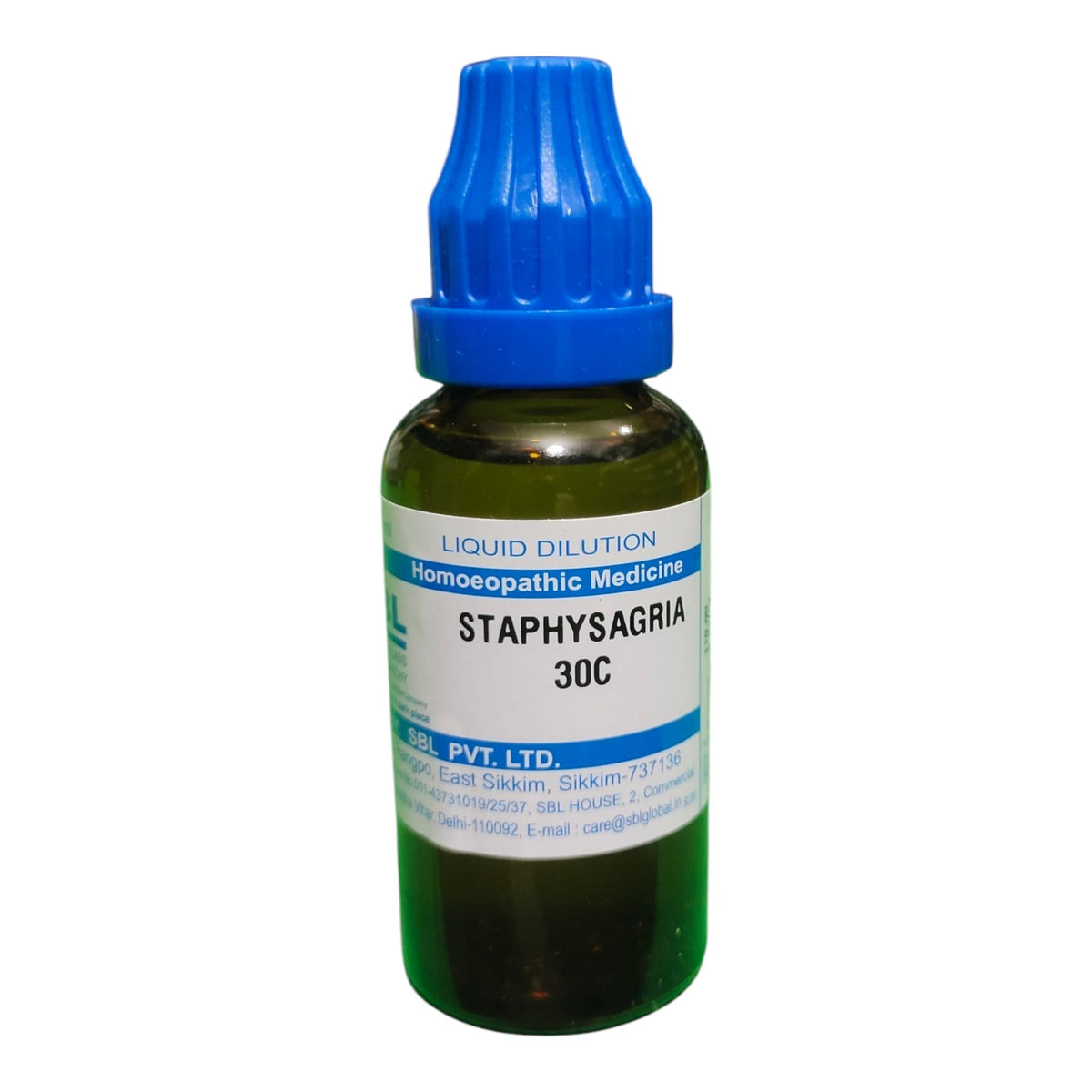 A small glass bottle of Staphysagria 30C liquid dilution homoeopathic medicine with a blue dropper cap, shown on a plain white background.