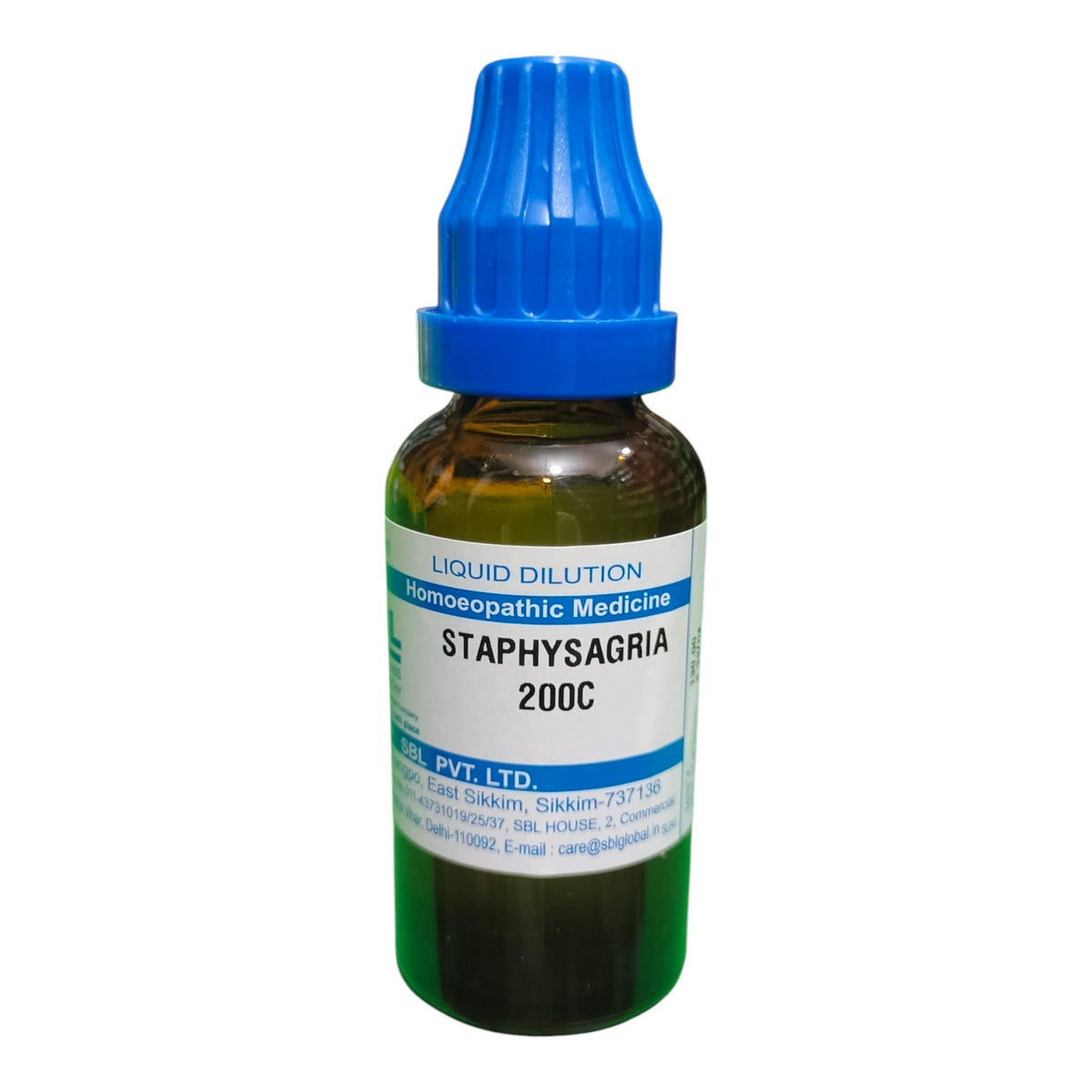A small amber glass bottle of Staphysagria liquid dilution homopathic medicine with a blue ribbed cap and a white label, shown on a plain white background.