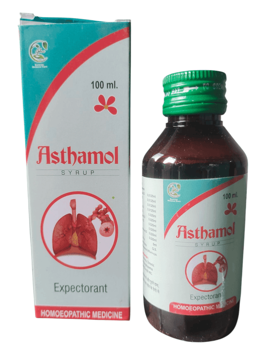 A bottle of Asthamol Syrup for asthma treatment alongside its packaging box. The label on the bottle and box features a graphic of lungs and leaves, indicating it is a homeopathic medicine.