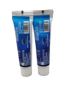 Two blue tubes with white caps on a white background