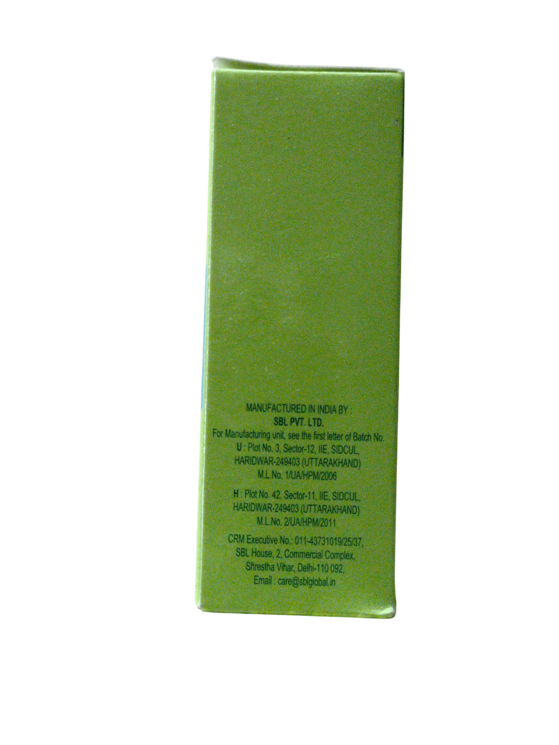 Green rectangular product packaging with text on a white background
