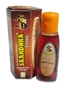 Saundhara massage oil bottle with packaging on a white background