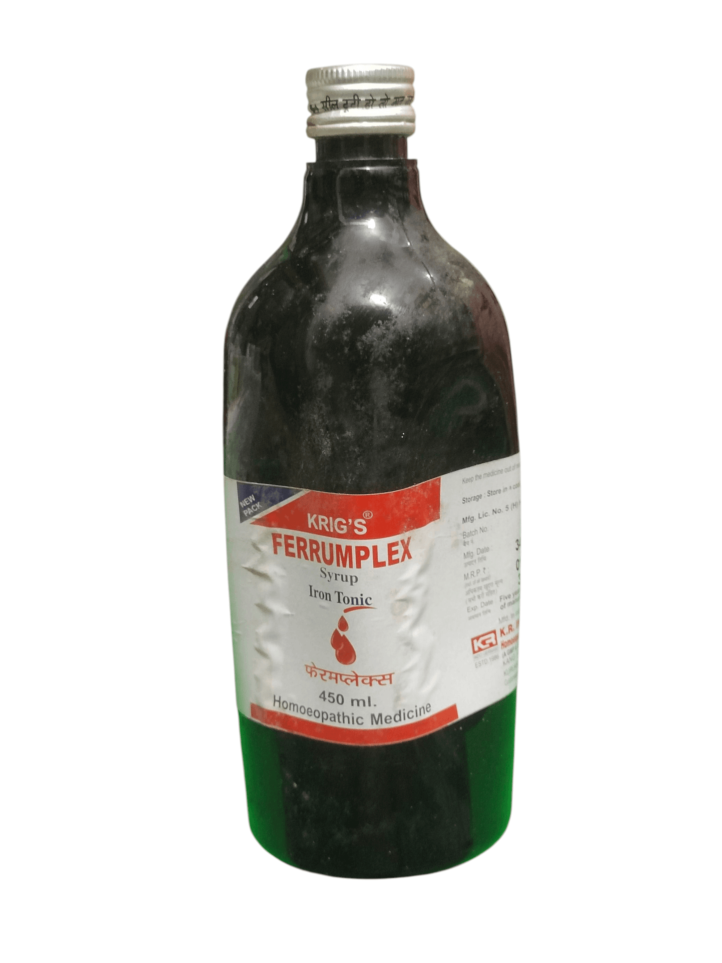 Bottle of Krig's Ferrumplex syrup on a white background