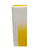 Box of homeopathic medicine with a yellow gradient on a white background