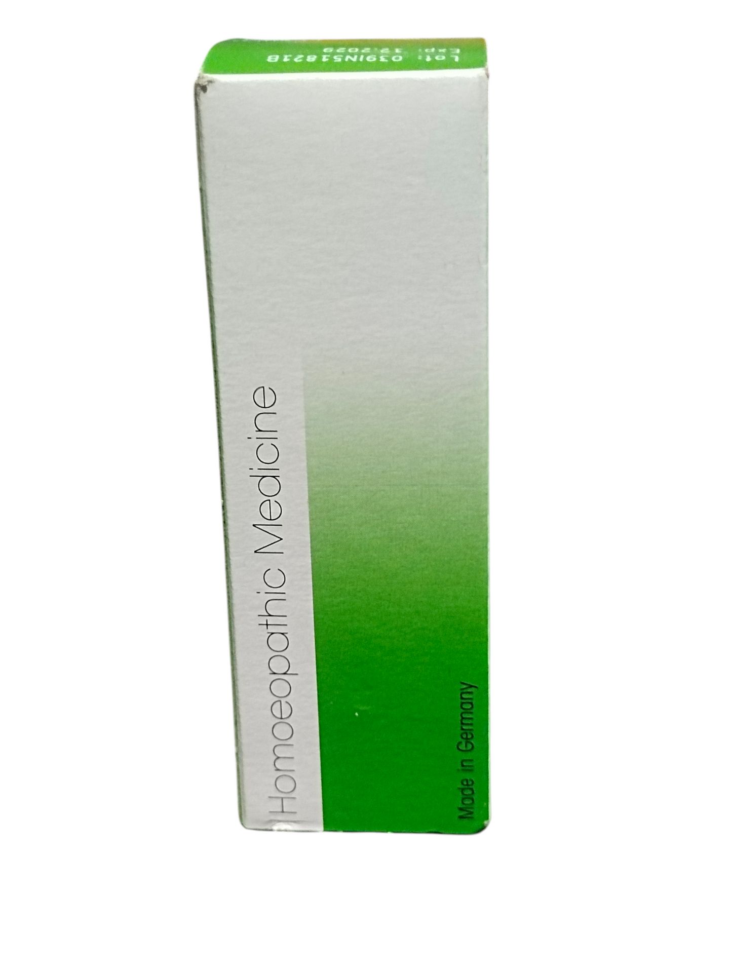 Homeopathic medicine box with green and white design on a white background