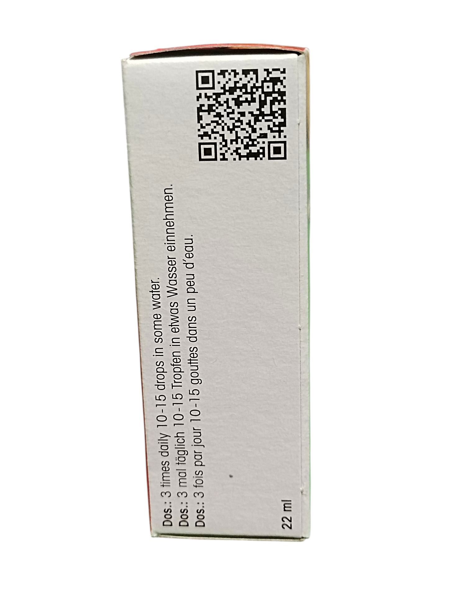 Medication container with QR code and text on a white background