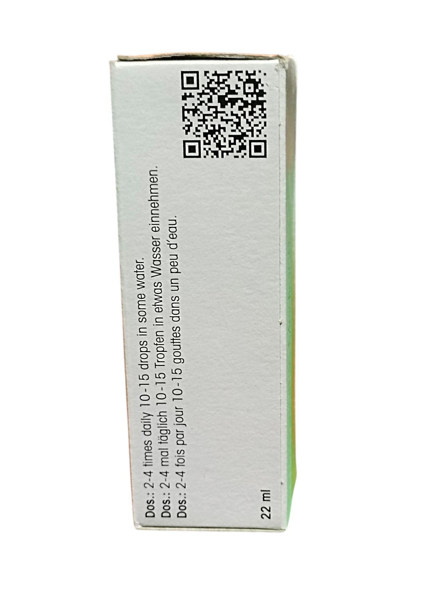 Medication box with QR code and text on a white background