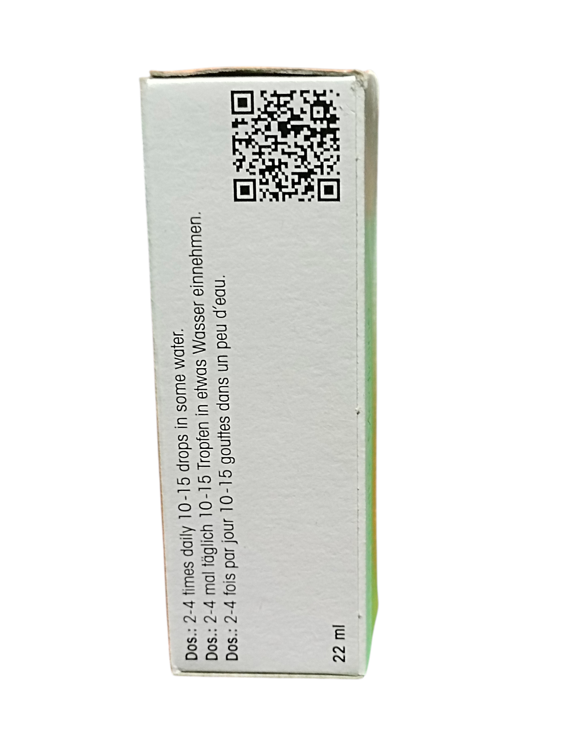 Medication box with QR code and text on a white background