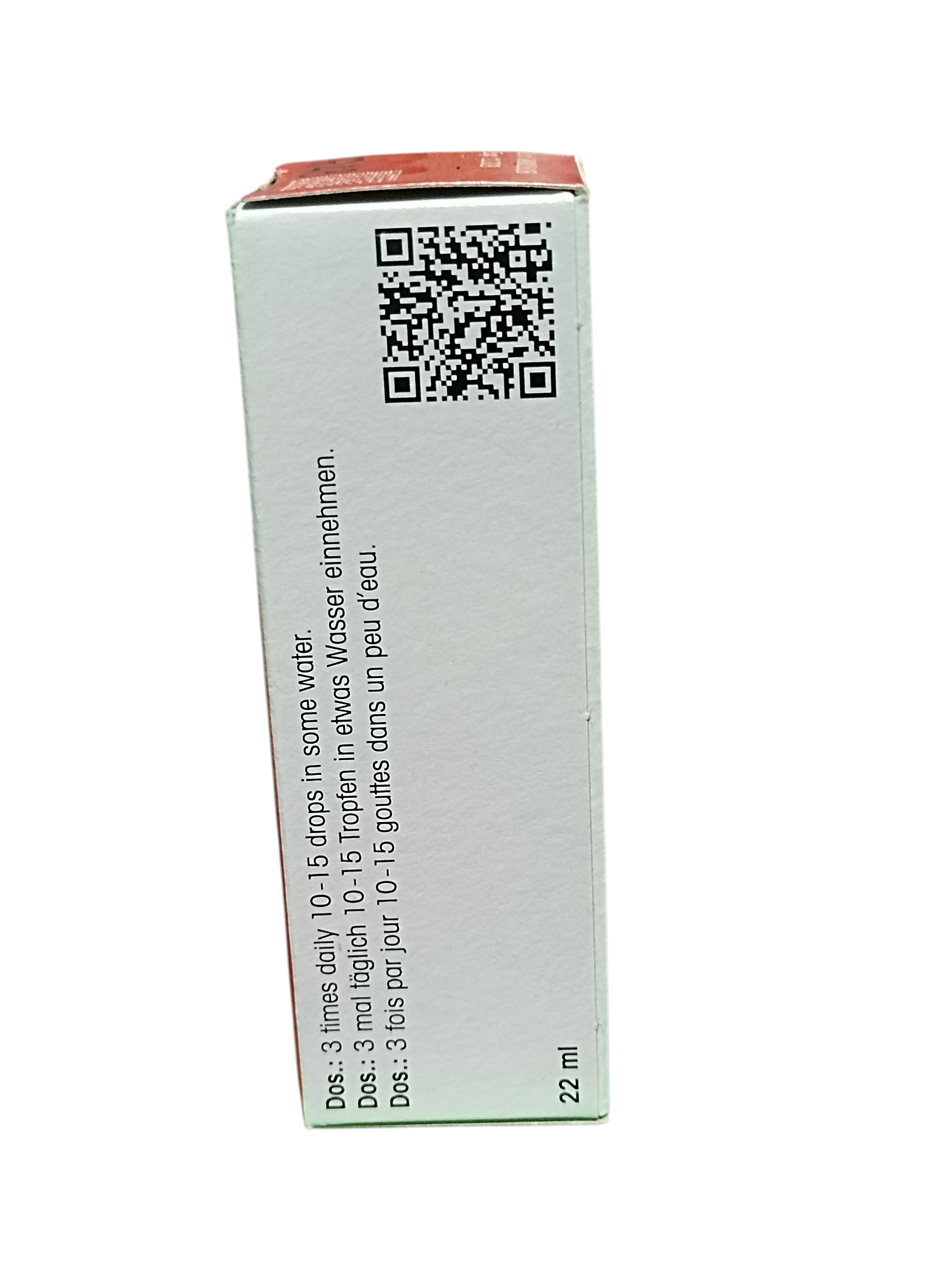 Medication container with QR code and text on a white background