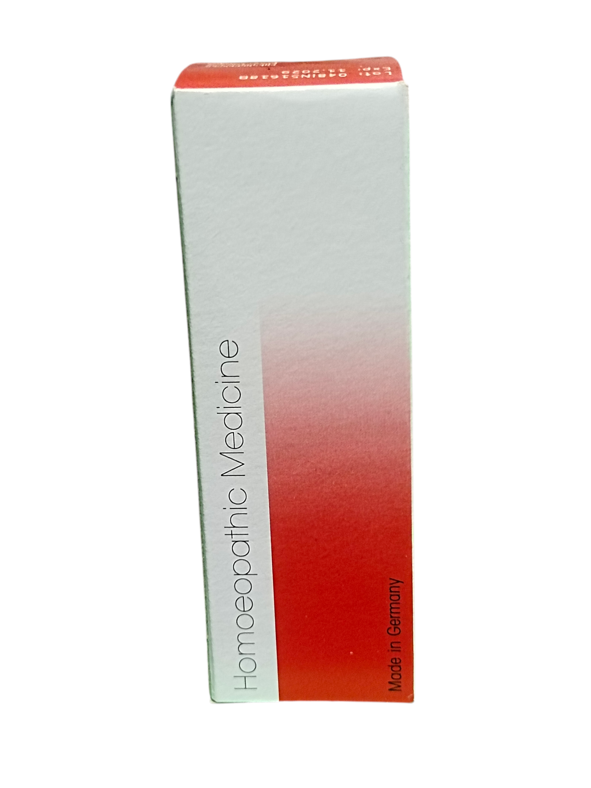 Box of homeopathic medicine with red and white design on a white background