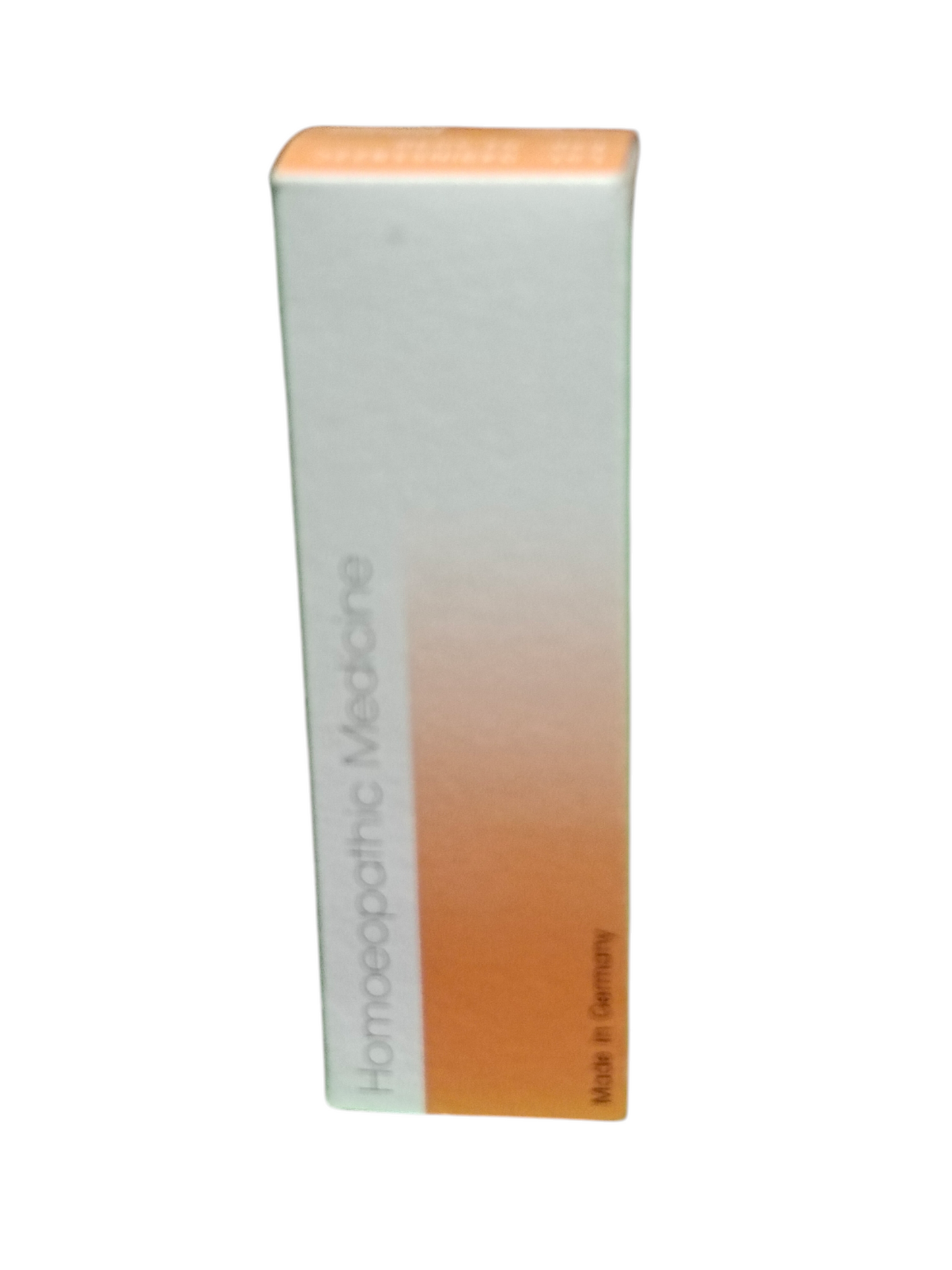 Tall rectangular box with a gradient design from white to orange on a white background