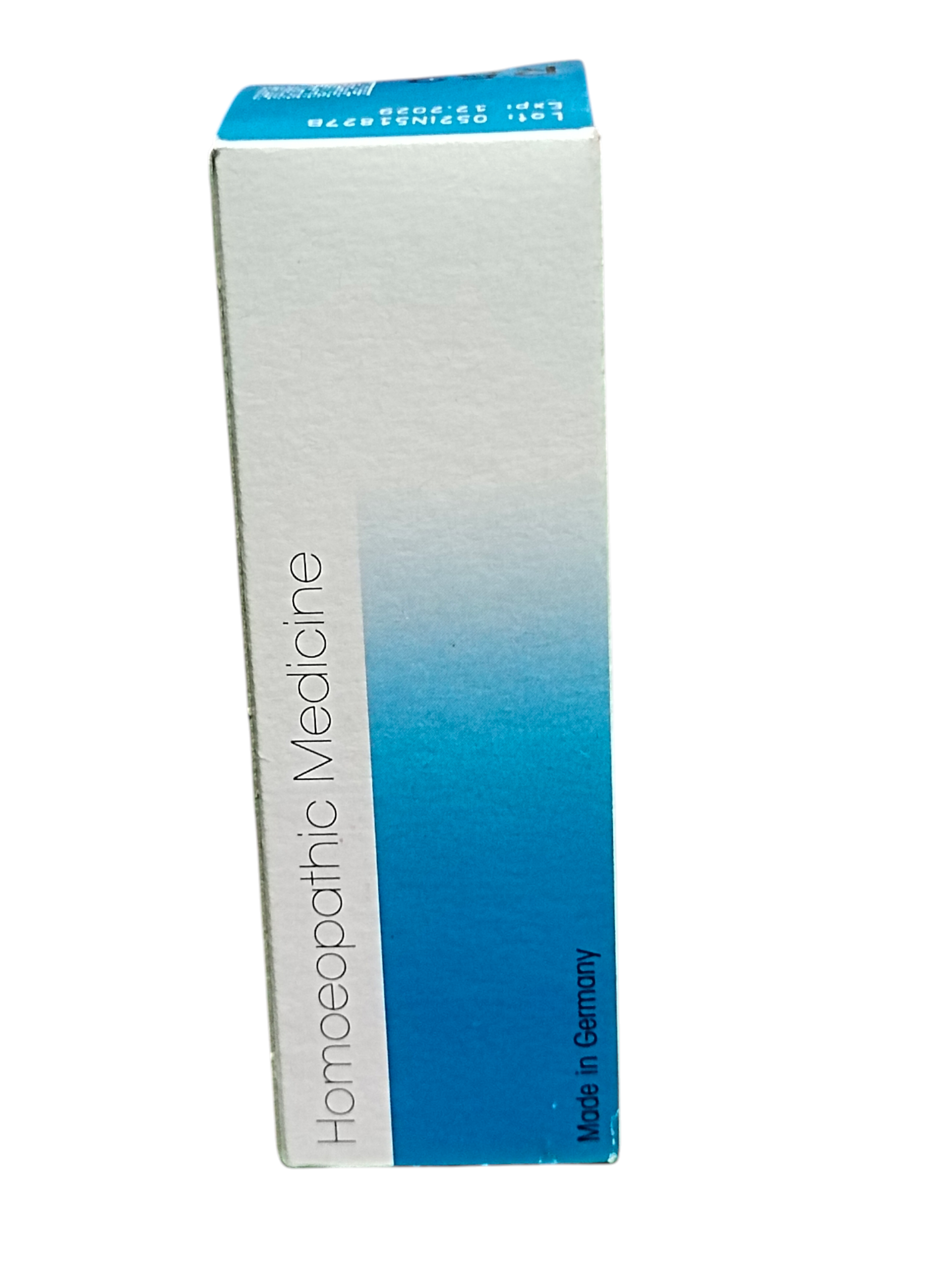 Box of homeopathic medicine with blue and white design on a white background