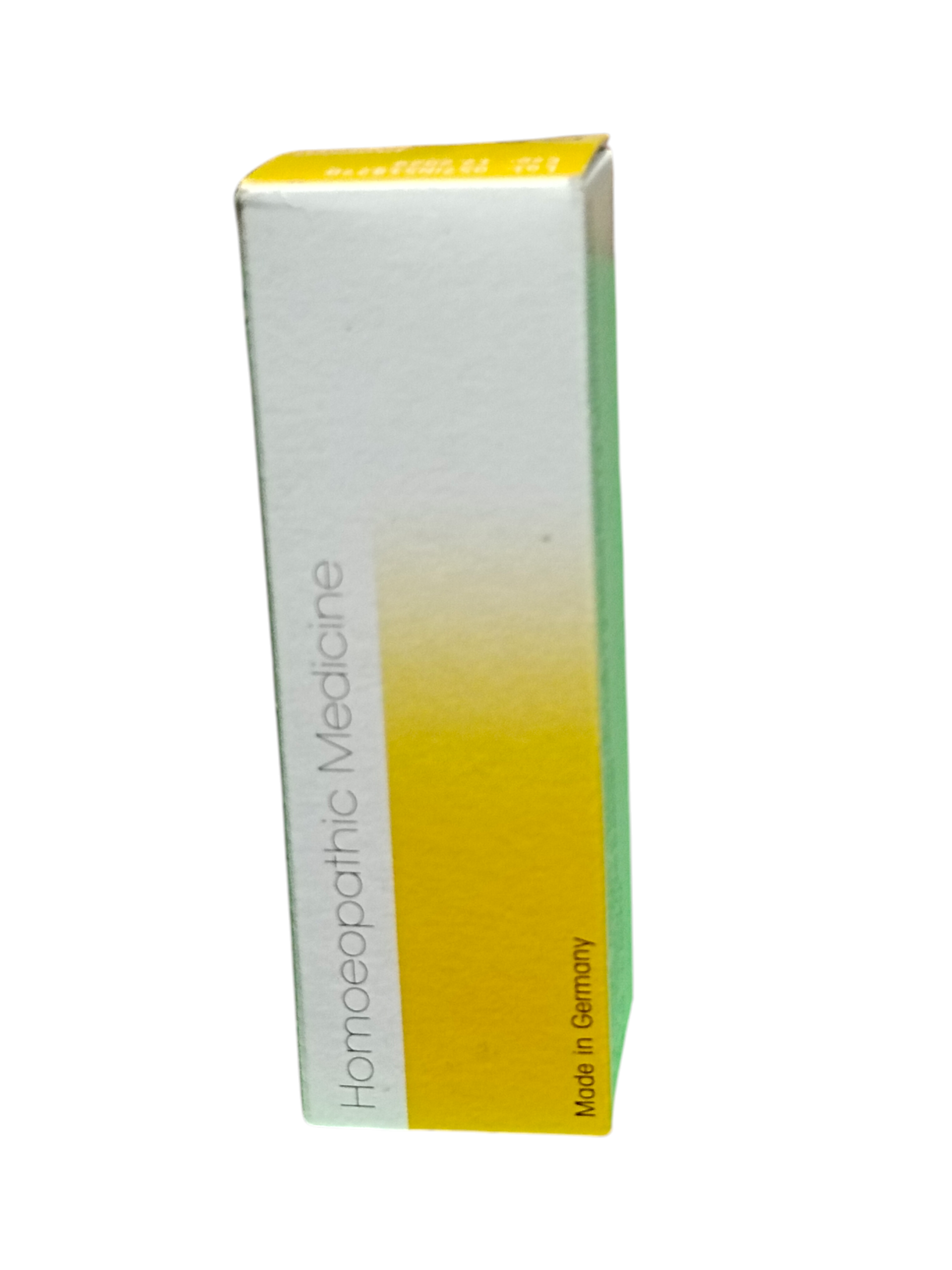 White and yellow box labeled 'Homeopathic Medicine' on a white background