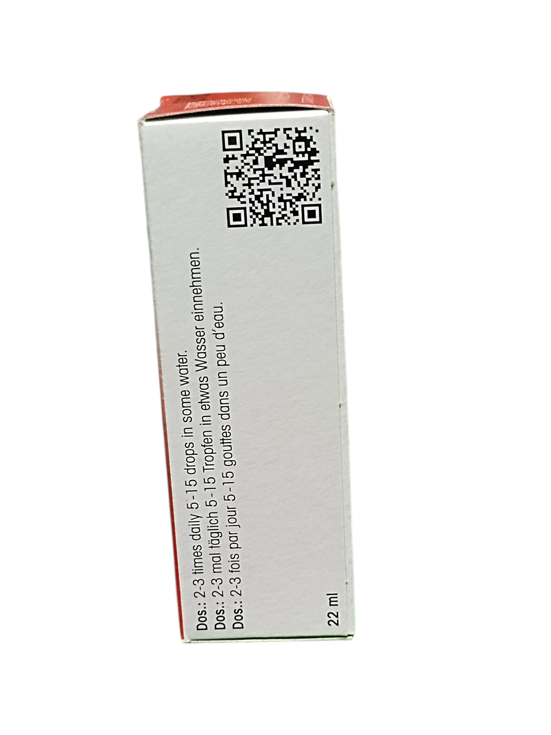 Medication box with QR code and text on a white background
