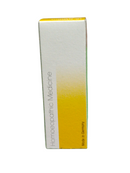 Box of homeopathic medicine with a white and yellow gradient design on a white background
