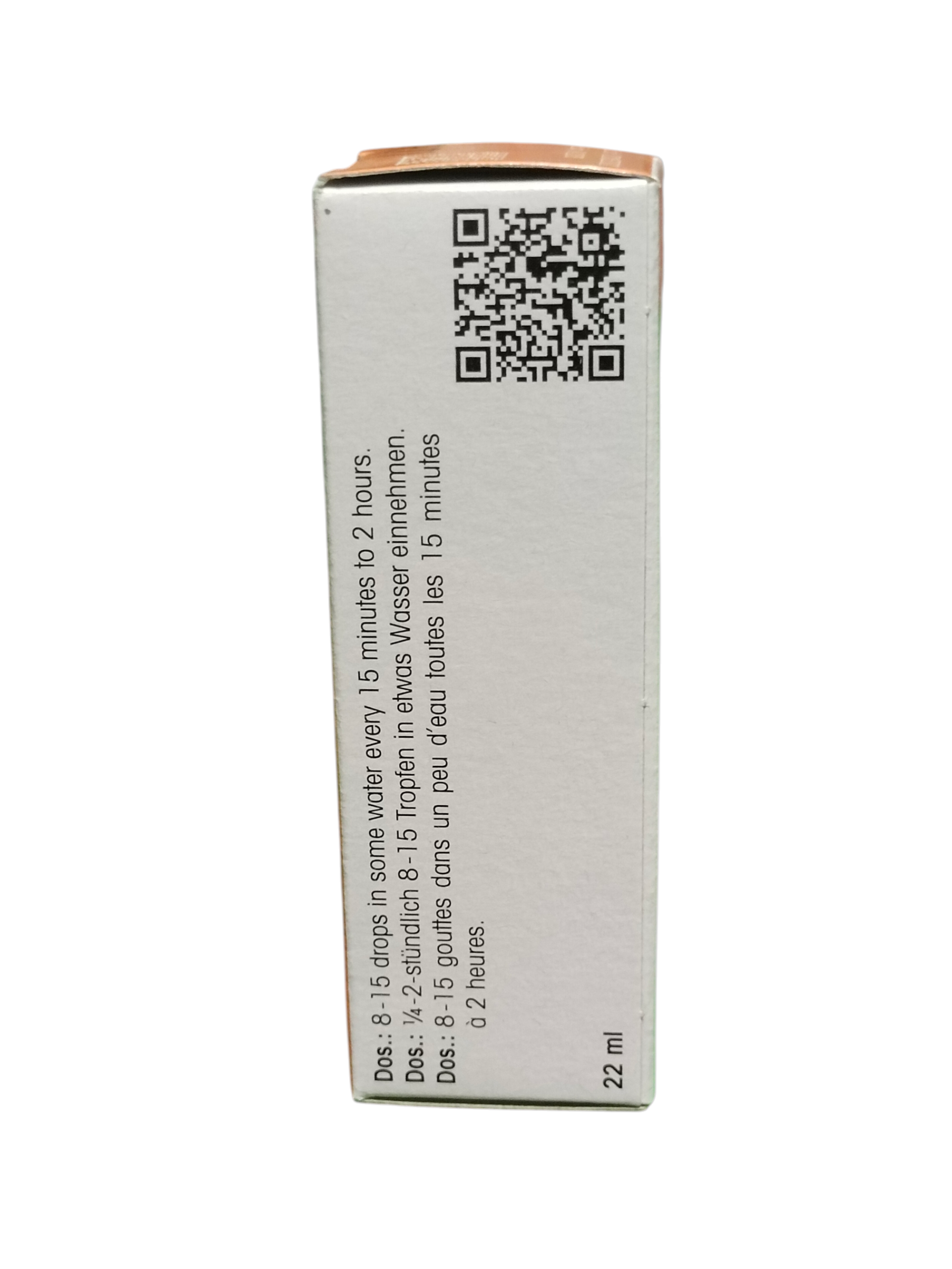 Product packaging with a QR code and text on a white background