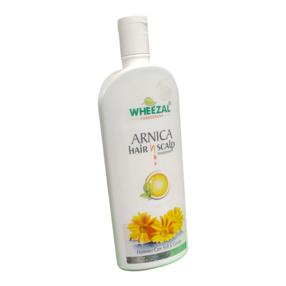 Wheezal Arnica Hair Scalp Treatment bottle on a white background