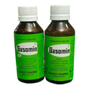 Two bottles of Gasomin medicine with green labels on a white background