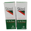 Two boxes of Skinol for skin disease on a white background