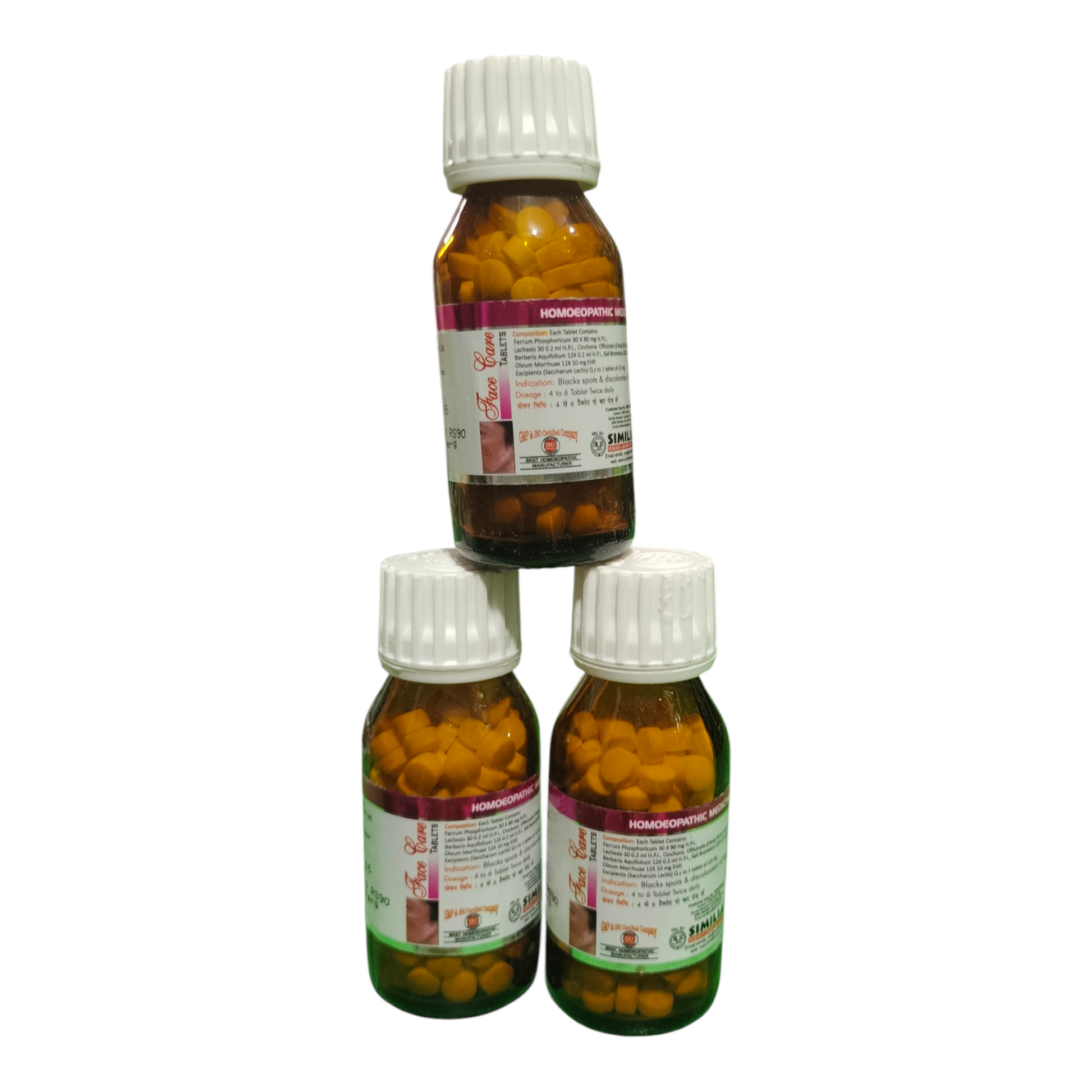 Three bottles of a medication with white caps on a white background