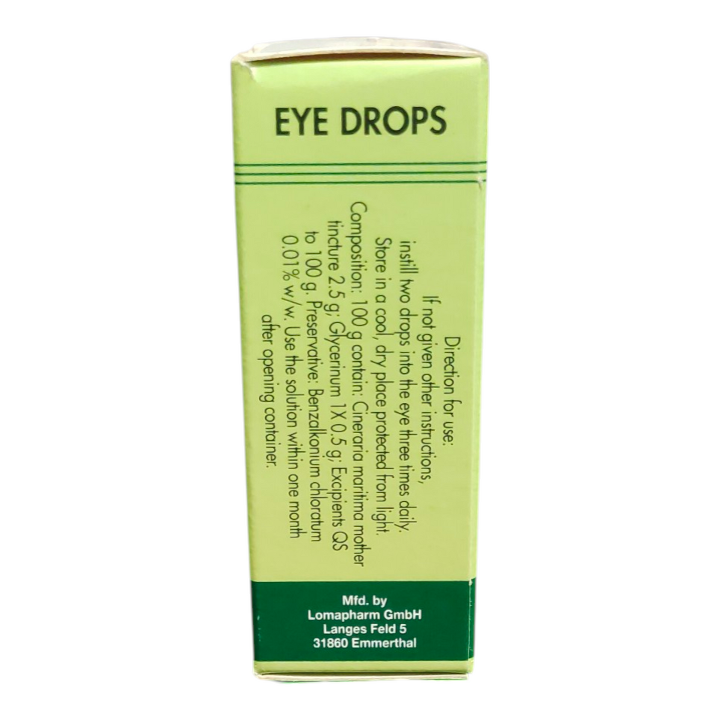 Green box of eye drops with text on a white background