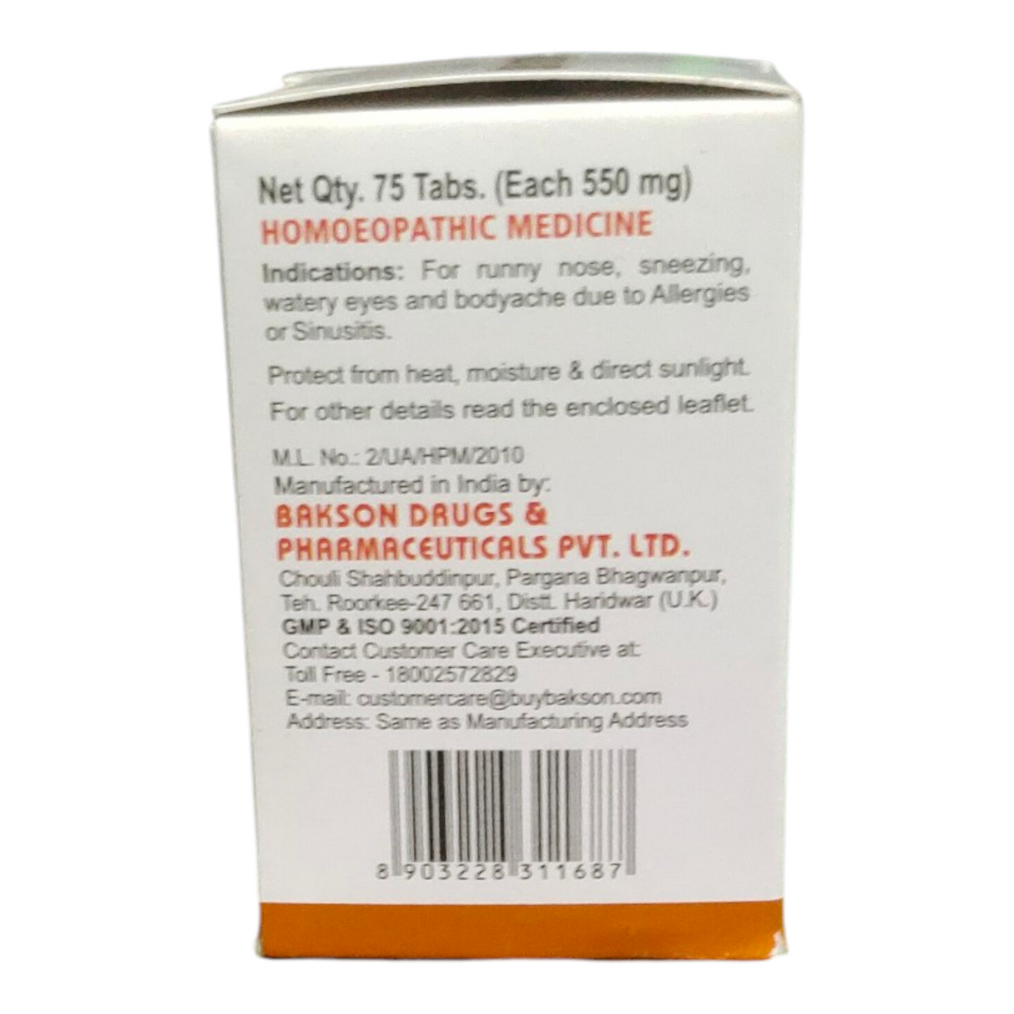 Back view of a homeopathic medicine packaging with text and contact information.