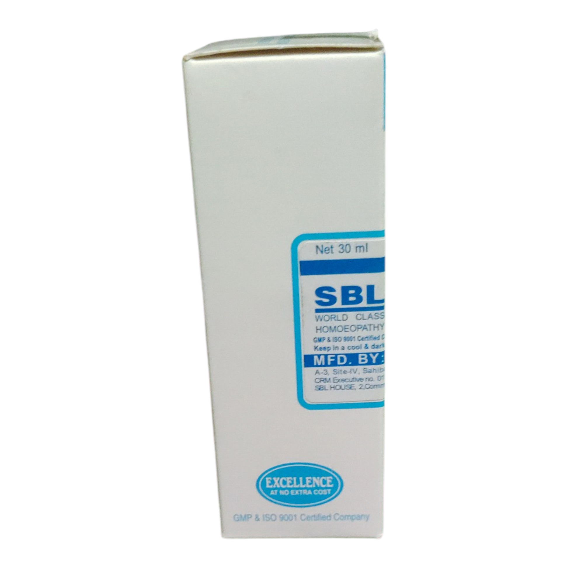 White bottle with blue label on a white background