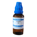 Bottle of Alumen 30C liquid dilution with blue cap on a white background