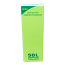 Green box of SBL homoeopathic medicine on a white background