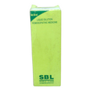 Green box of SBL liquid dilution homoeopathic medicine on a white background