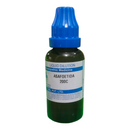 Bottle of Asafoetida liquid dilution with blue cap on a white background