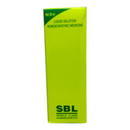 Green box of SBL liquid dilution homoeopathic medicine on a white background