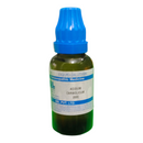 Bottle of homeopathic medicine with a blue cap on a white background