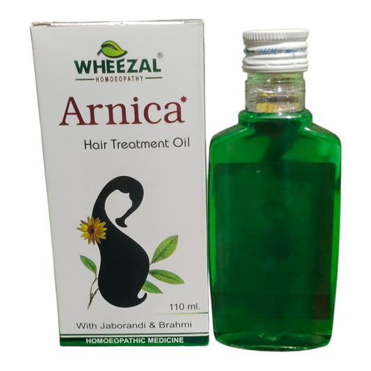 Wheezal Arnica Hair Treatment Oil bottle and packaging on a white background