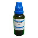 Bottle of Carcinosin 1000C with blue cap on a white background