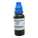 Bottle of Janosia Ashoka homeopathic medicine with a blue cap on a white background