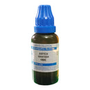 Bottle of Justicia Adhatoda liquid dilution with blue cap on a white background
