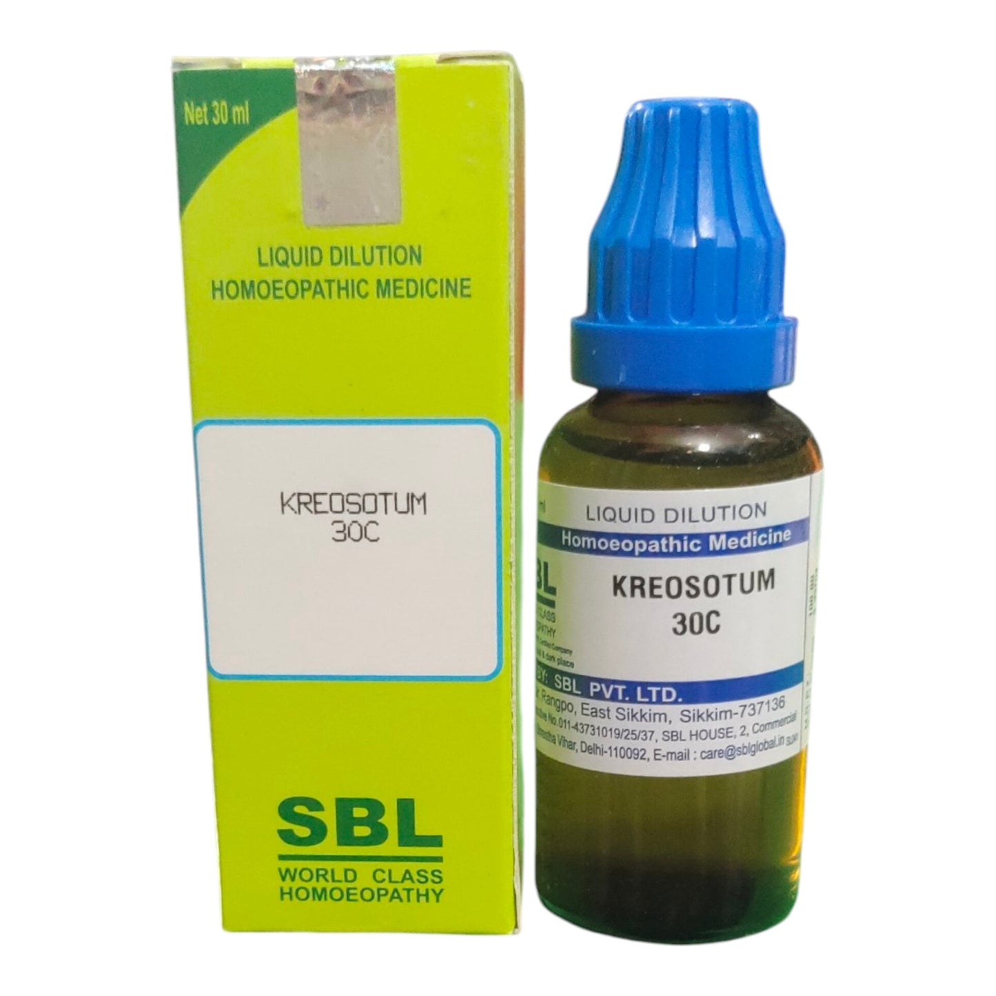 Homeopathic medicine bottle and packaging with SBL branding on a white background