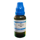 Bottle of Kali Muriaticum homeopathic medicine with blue cap on a white background
