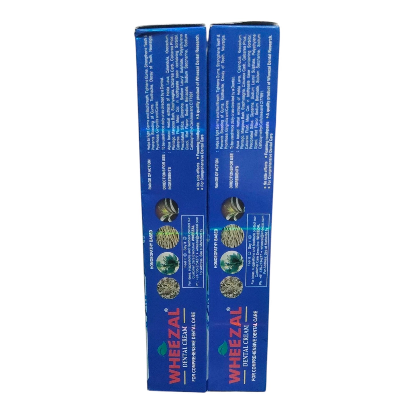 Two blue rectangular boxes of Whhezal Dental Cream shown side by side on a plain white background.