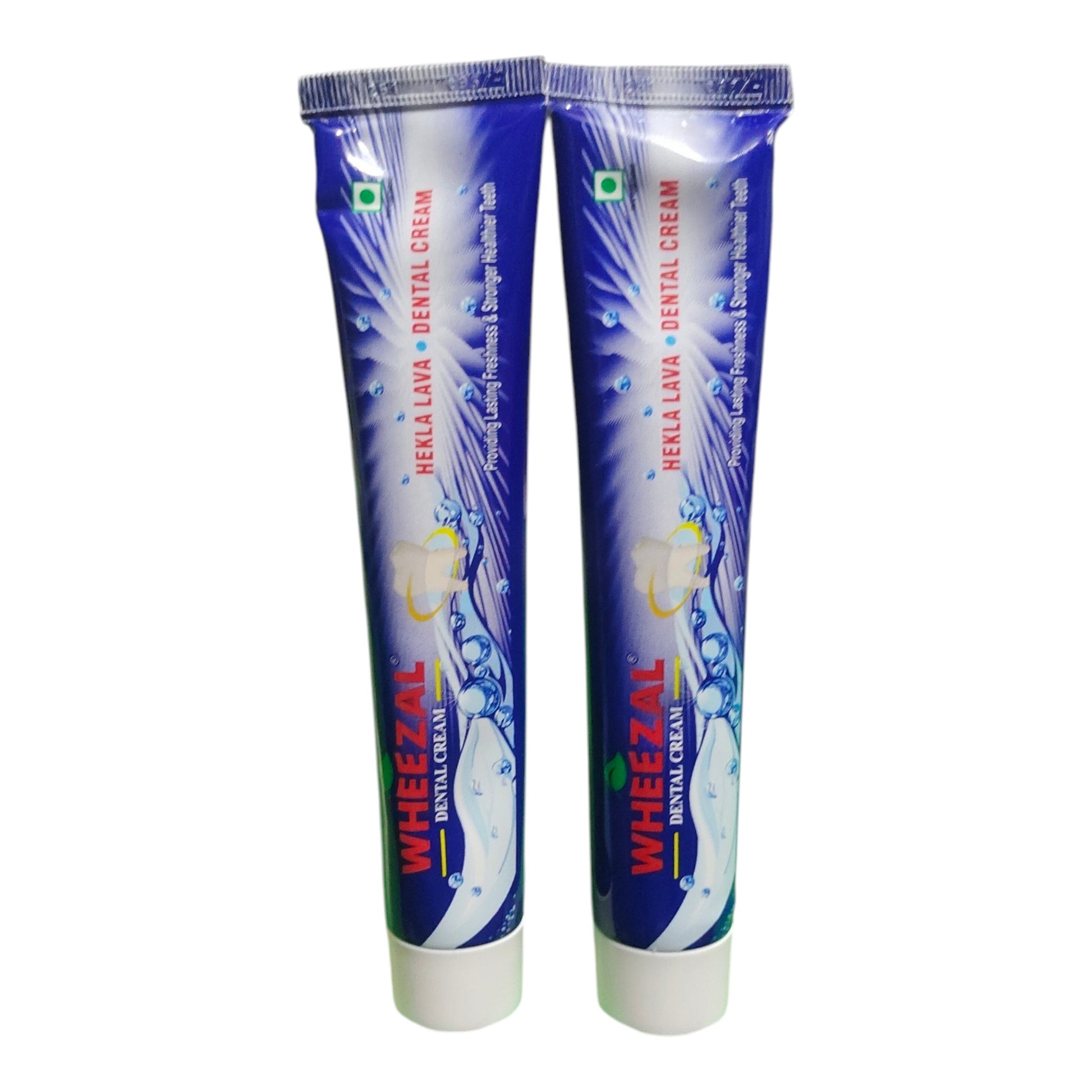 Two tubes of Wheezal Herbal + Dental Cream shown side by side on a plain white background.