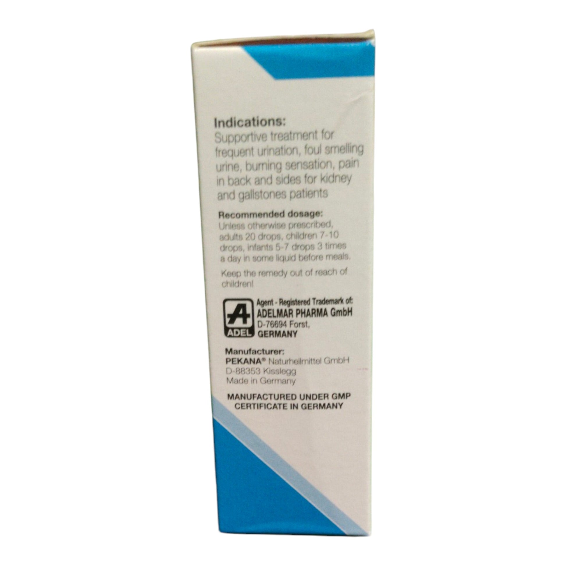 A tall rectangular medicine box shown upright against a plain white background, with printed text detailing indications, dosage, and manufacturer information. The box is white with blue accents at the top and bottom.