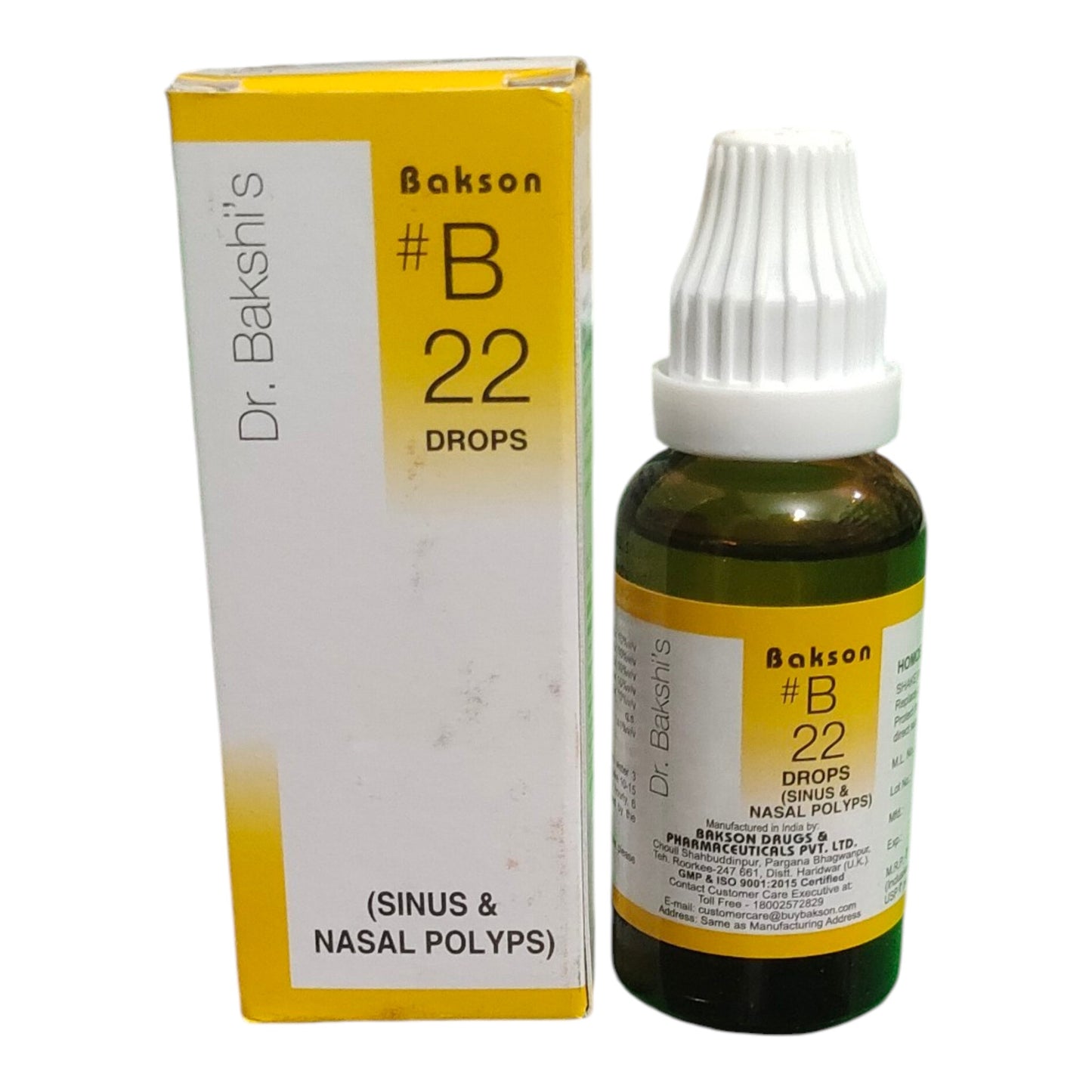 A bottle of Bakson #B 22 Drops next to its yellow and white retail box, featuring a white ribbed cap, on a plain white background.