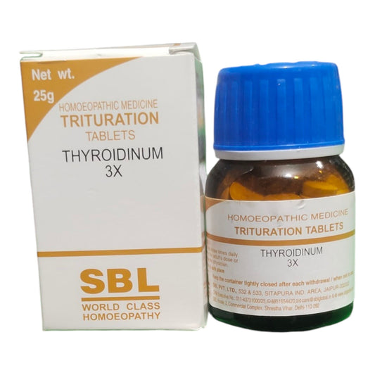 SBL World Class Homoeopathy Thyroidinum 3X tablets shown with its white and orange packaging box next to a brown amber glass bottle with a blue cap.
