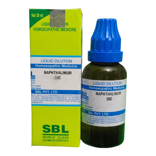 A bottle of SBL Liquid Dilution Naphthalinum 30C homeopathic medicine next to its lime green and white packaging box, on a plain white background.
