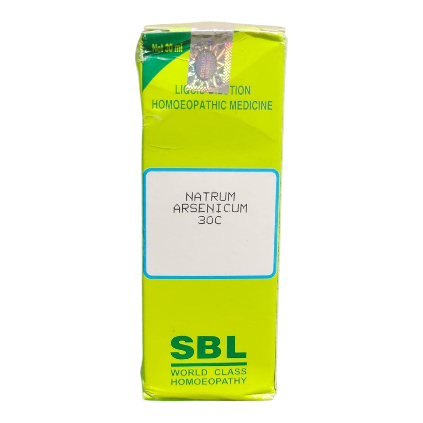 A bright lime green box of SBL Natrum Arsenicum 30C homeopathic medicine, photographed against a plain white background.
